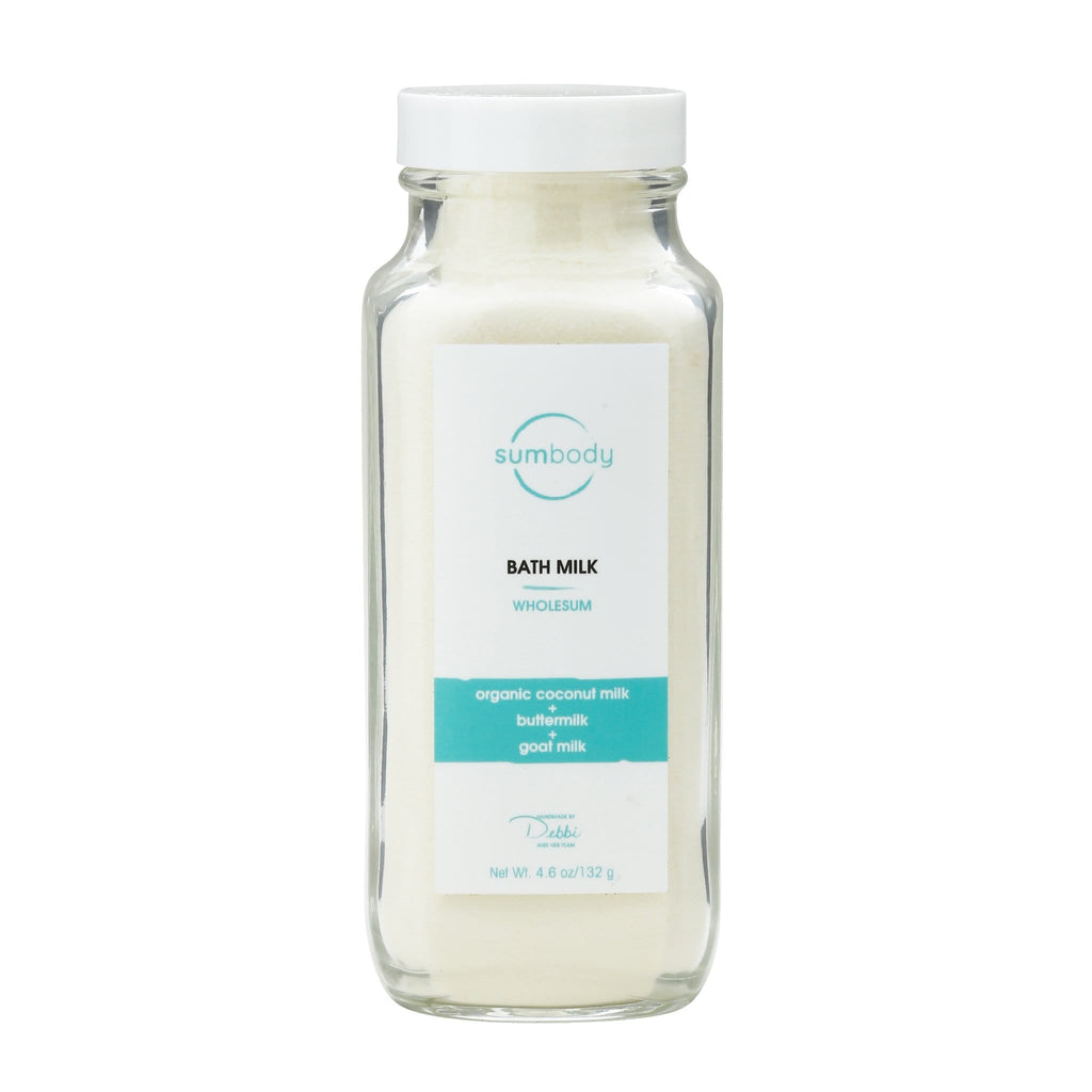 Bottle of Wholesum Bath Milk featuring organic coconut, buttermilk, and goat milk