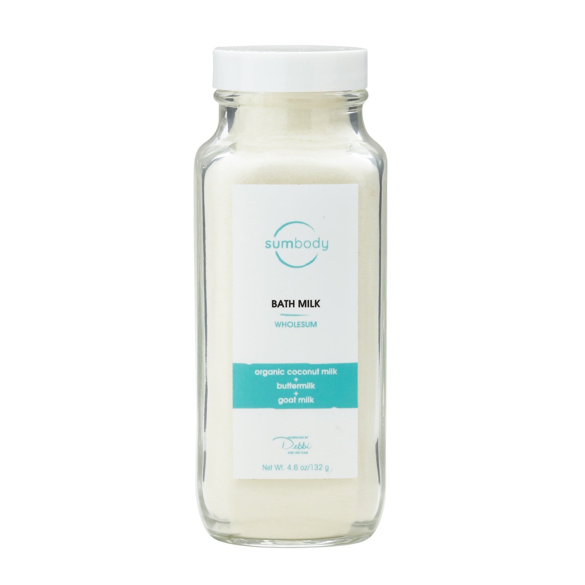 Bottle of Wholesum Bath Milk featuring organic coconut, buttermilk, and goat milk