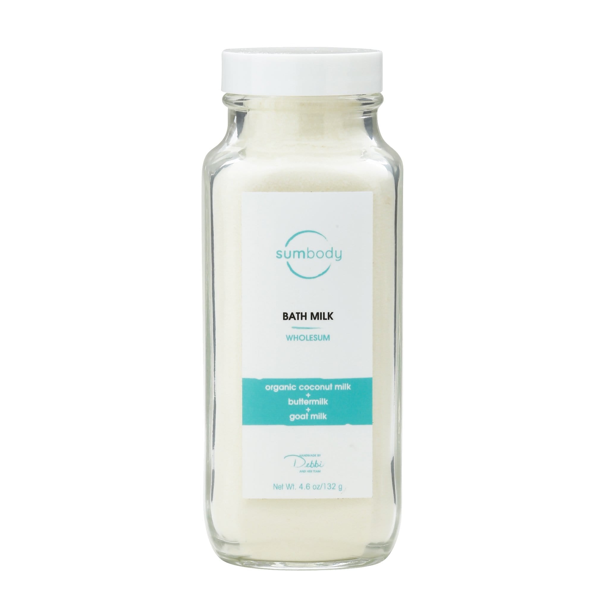 Bottle of Wholesum Bath Milk featuring organic coconut, buttermilk, and goat milk