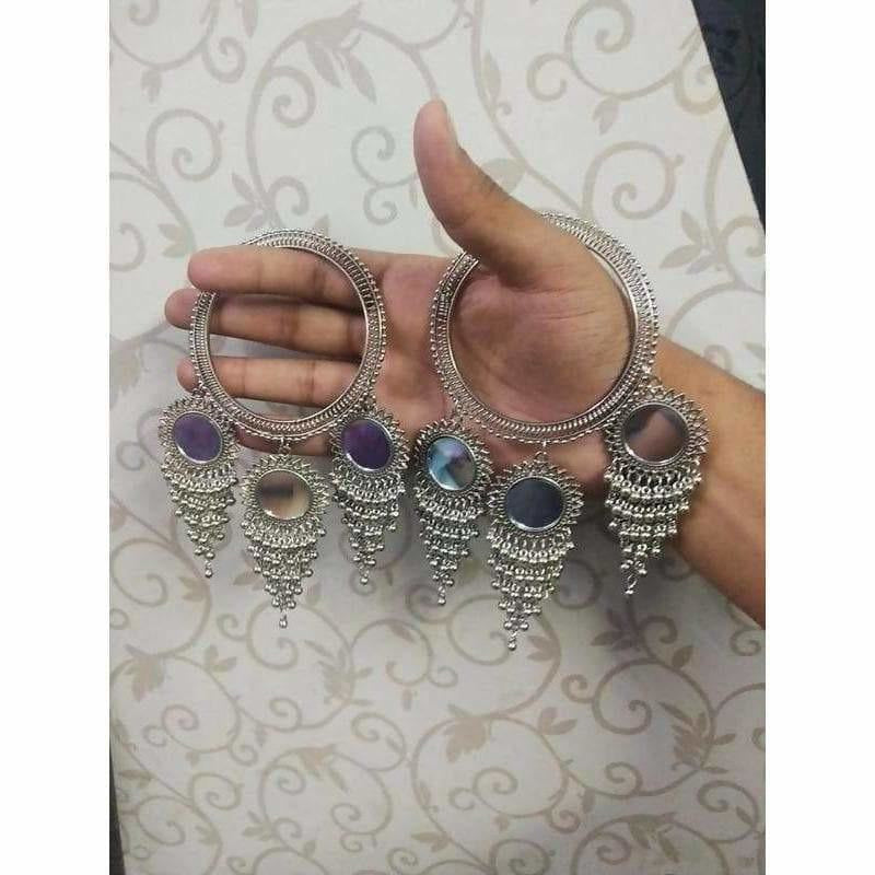 Wide silver-toned bangle with intricate mirror work and pearl accents
