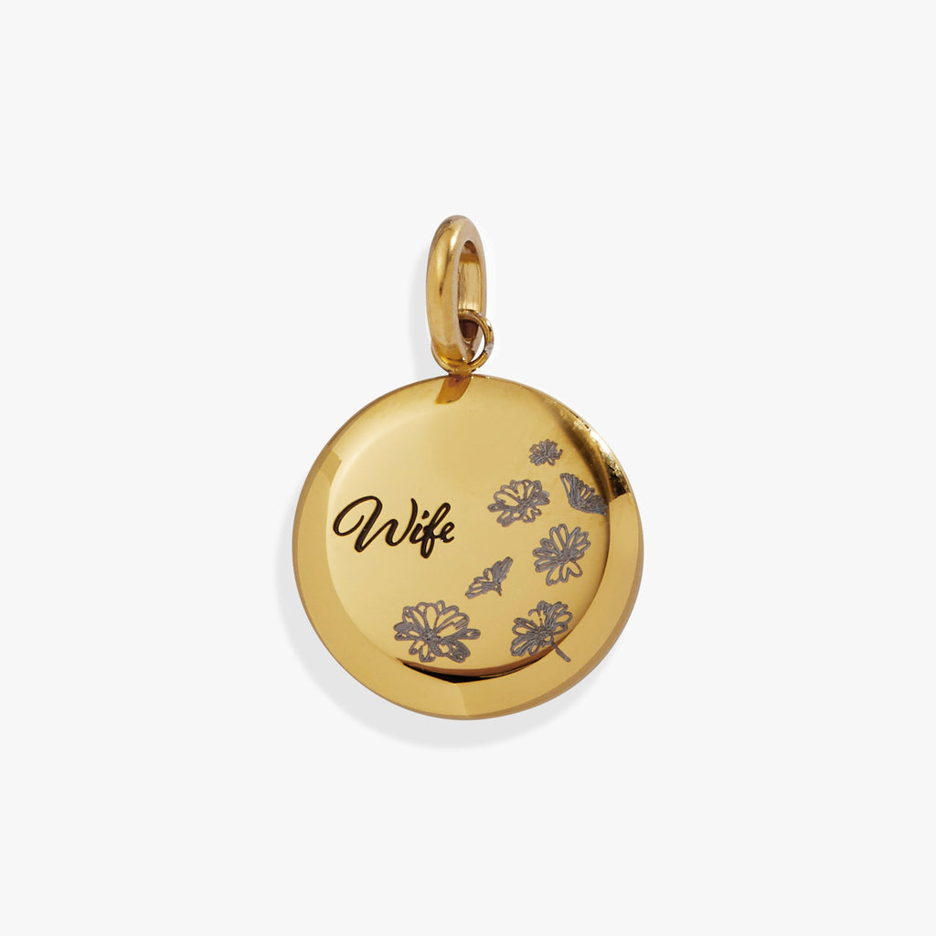 Polished gold and silver Wife Flower Disc Charm featuring floral etchings and a sentimental inscription.