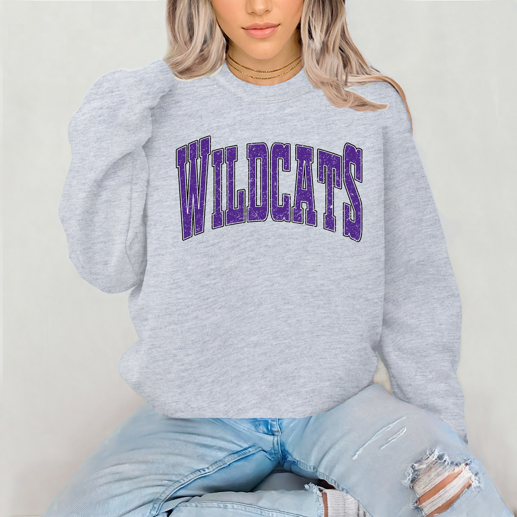 Unisex Wildcats Arch graphic design on a heather grey t-shirt and crewneck sweatshirt