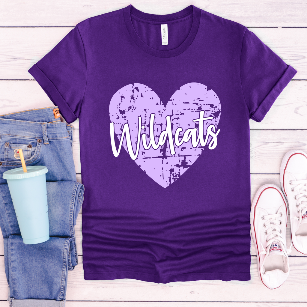 Wildcats Grunge Heart graphic printed on a purple unisex t-shirt and purple hooded sweatshirt