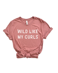 Close up of a bold Wild Like My Curls graphic t-shirt for adults