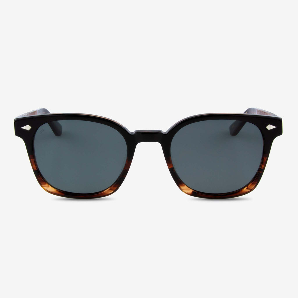 Williston round sunglasses with acetate and wood frame featuring arrow rivet design.