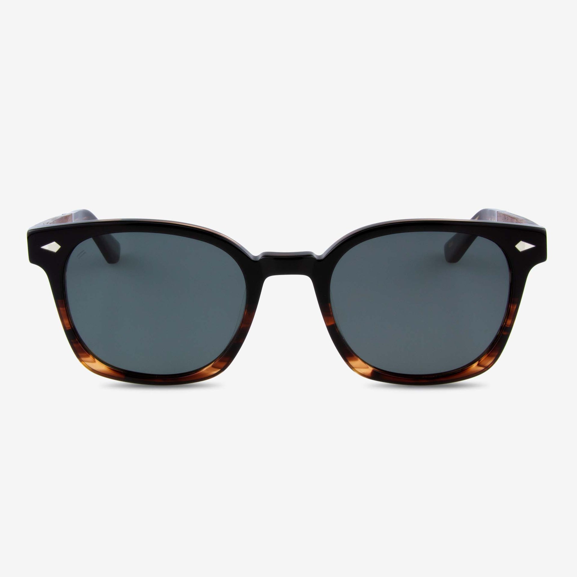 Williston round sunglasses with acetate and wood frame featuring arrow rivet design.
