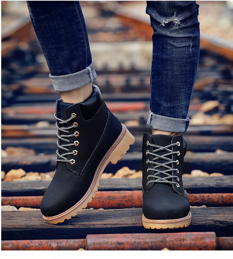 Men's leather winter ankle boots in brown with plush fur lining and lace-up closure