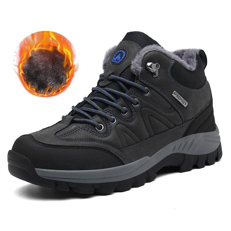 Rugged men's waterproof leather winter snow boots in black and tan with fur lining.