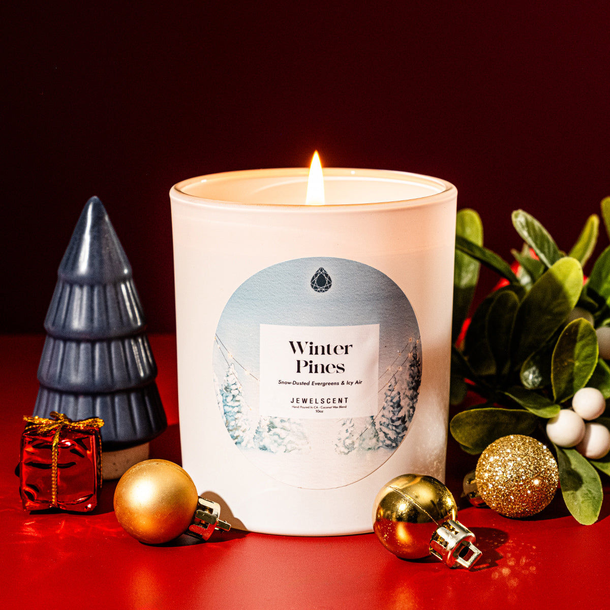 Winter Pines 10oz signature jewelry candle in glass jar with a snowy forest aesthetic