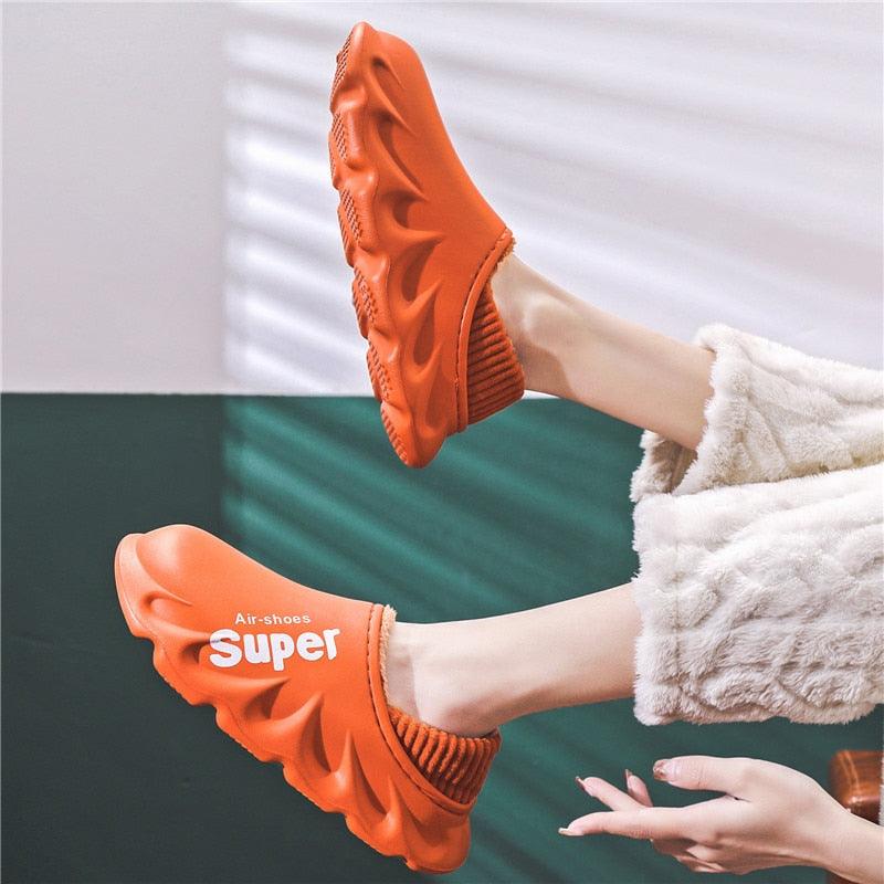 Unisex waterproof memory foam slippers with plush fleece lining and non-slip sole