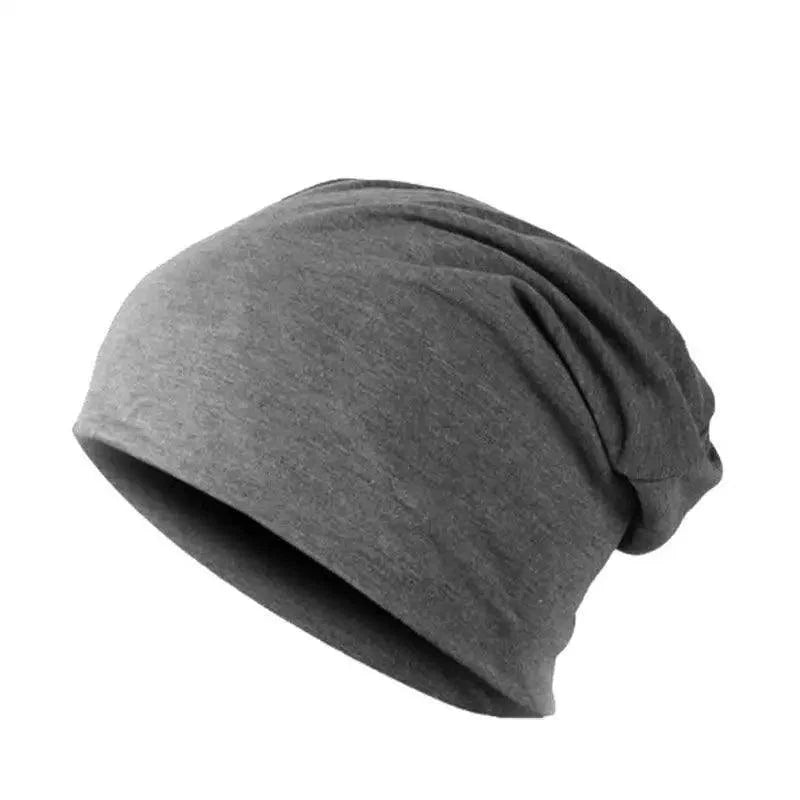 Unisex baggy knitted winter beanie hat in solid color soft acrylic fabric