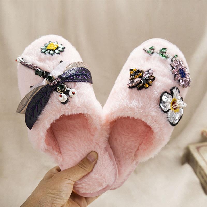 Women's plush memory foam slippers with faux fur lining and chenille knit upper in a slip-on slide design.