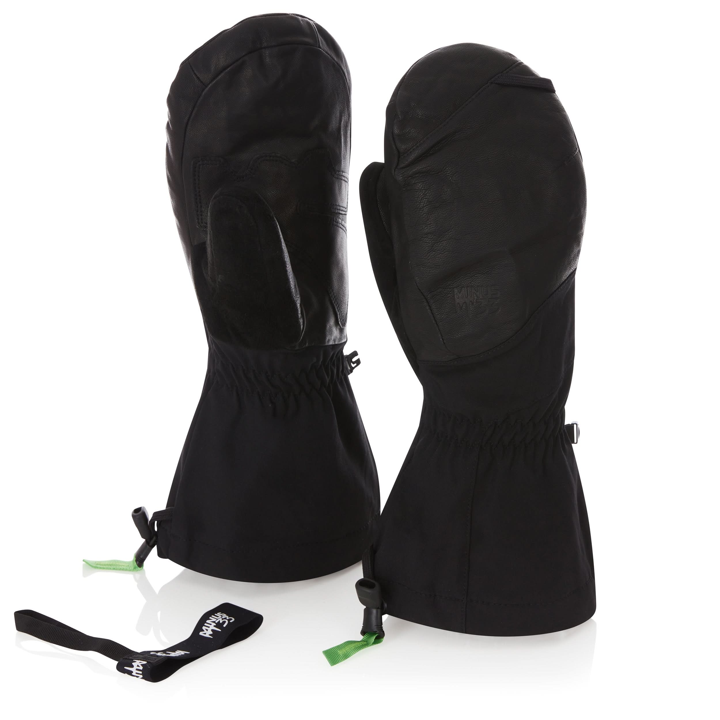 A pair of black and tan leather waterproof ski mittens with wool insulation for winter sports.