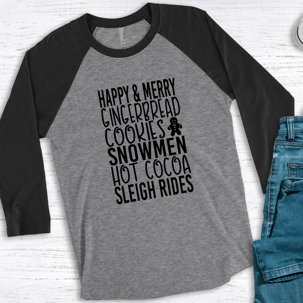 Grey and black triblend 3/4 sleeve raglan tee with the text Happy & Merry Gingerbread Cookies Snowmen Hot Cocoa Sleigh Rides