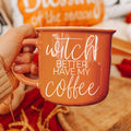 Orange ceramic mug with white text saying Witch Better Have My Coffee
