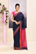 Navy blue cotton blend Jamdani saree with decorative embellishments.