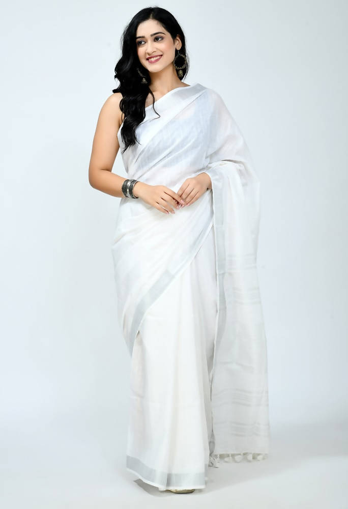 A sophisticated white Bhagalpuri handloom cotton saree with a matching white blouse piece.
