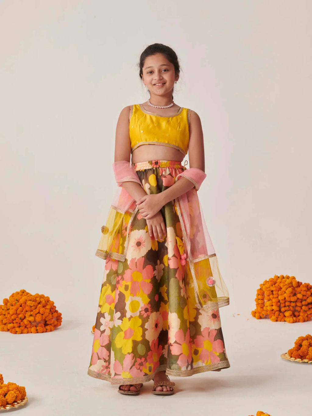 Yellow lehenga choli with silk blend fabric and net dupatta