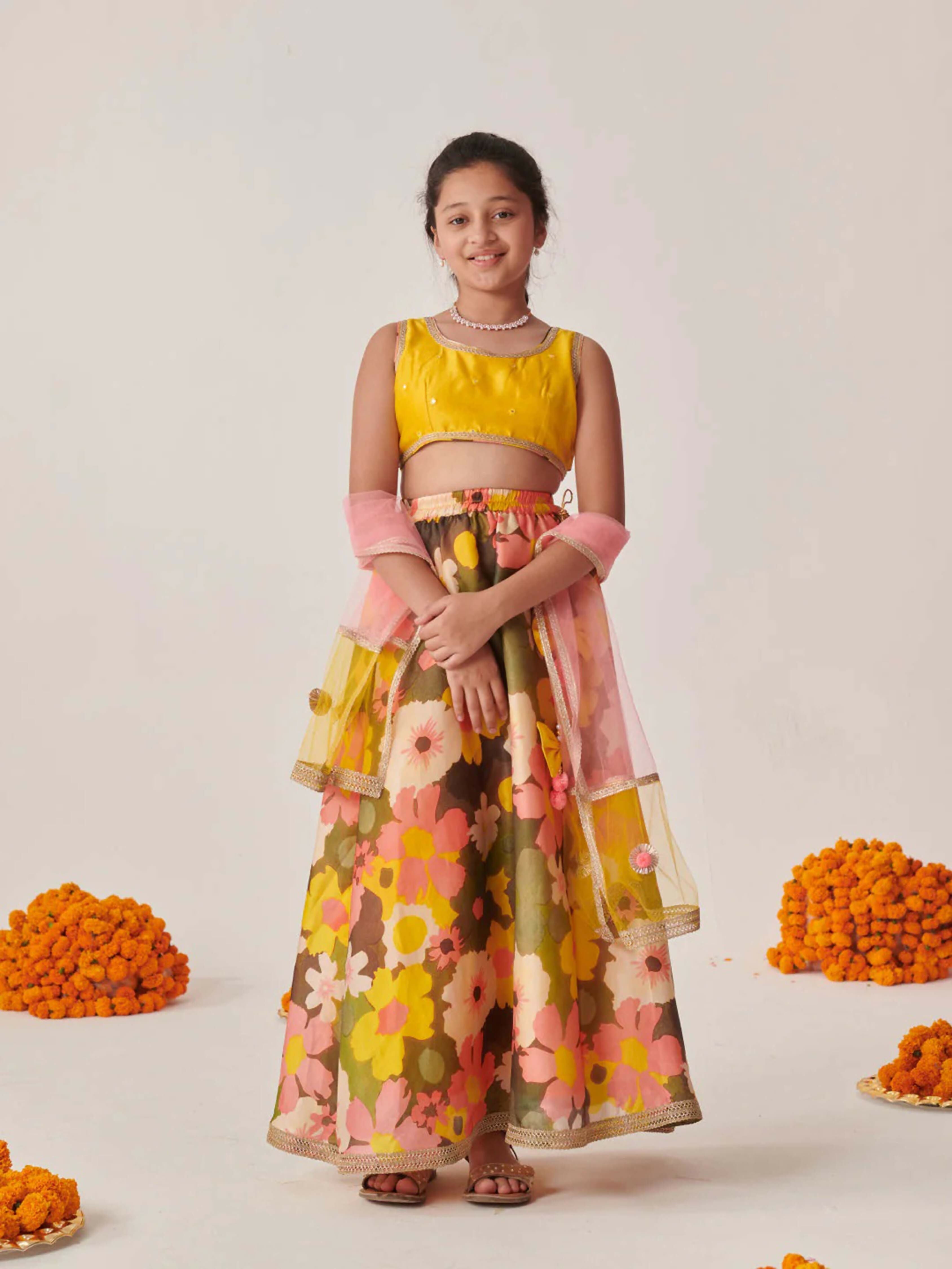 Yellow lehenga choli with silk blend fabric and net dupatta