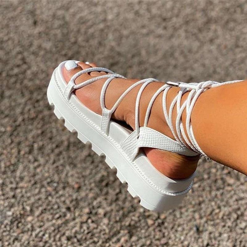 White women's platform lace-up sandals with ankle wrap straps and non-slip sole