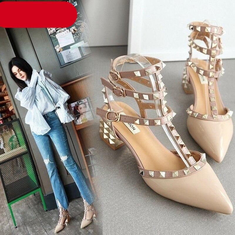 Luxury pointed toe high heel sandals with adjustable straps in a sophisticated design.