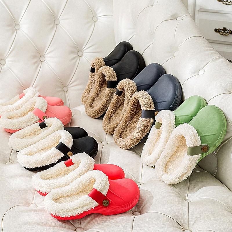 A pair of minimalist waterproof EVA winter clogs with plush lining in solid color