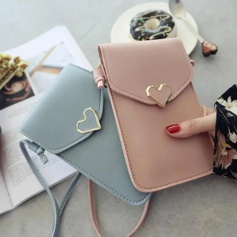 Stevvex transparent shoulder bag with gold hardware and internal card holder pockets