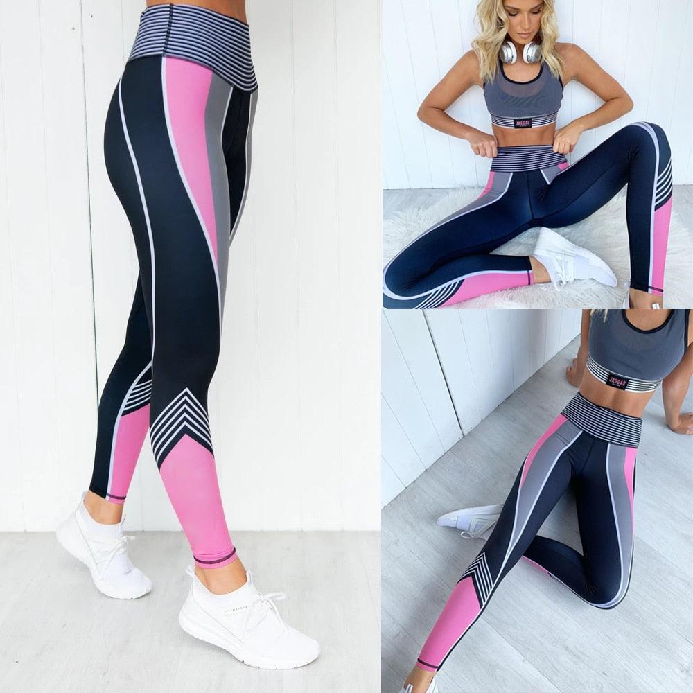 Woman wearing high-waisted black compression leggings for gym and yoga workout