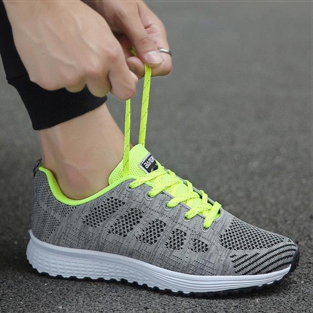 White breathable mesh walking sneakers for women with lightweight memory foam sole
