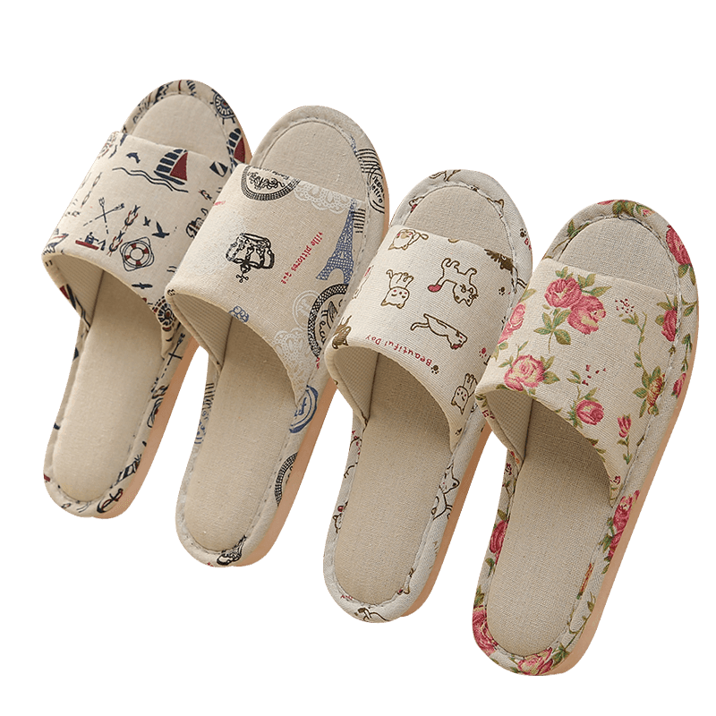 Top-down view of women's soft cotton floral indoor slippers with open-toe design