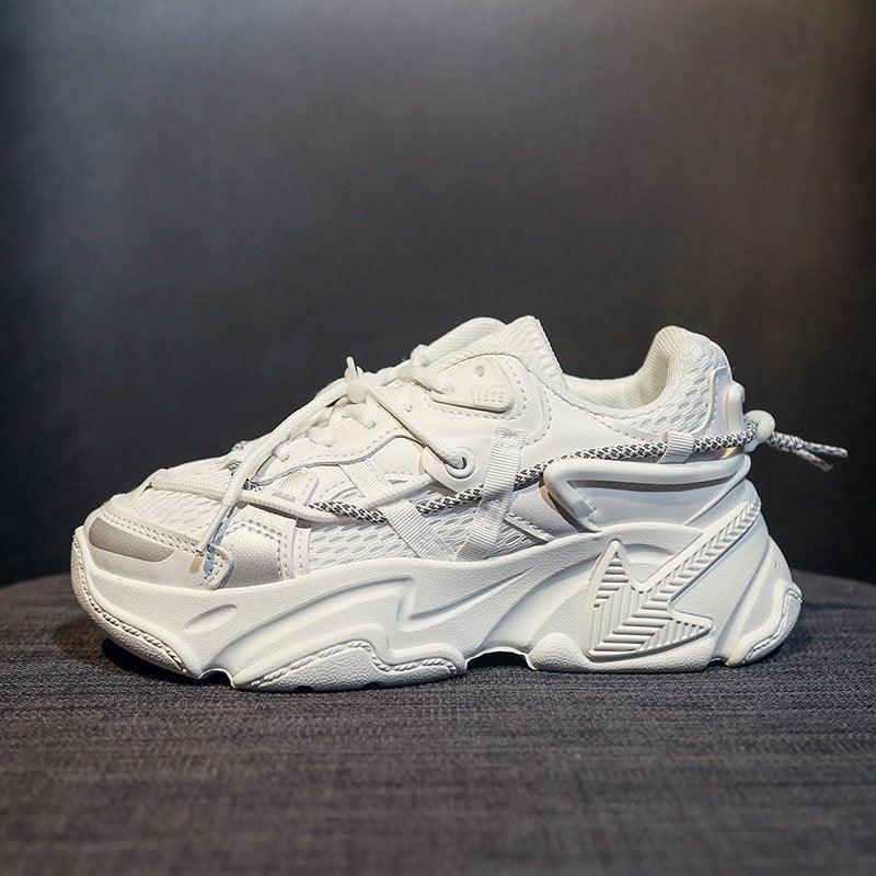 Women's white leather platform sneakers in a chunky Y2K streetwear style