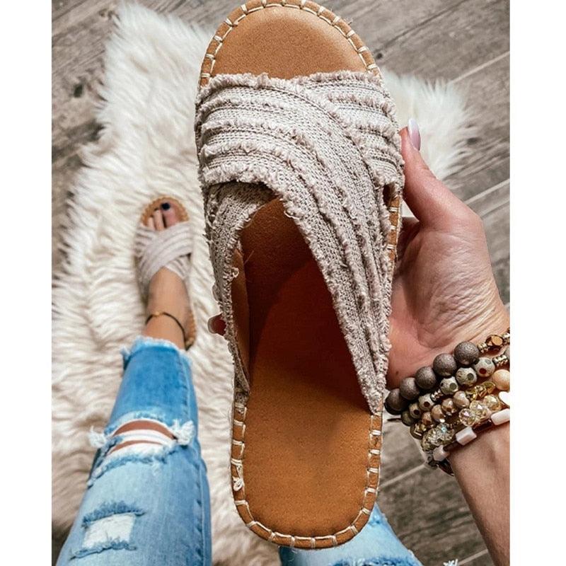 Women's beige canvas knotted flat slide sandals with open-toe design