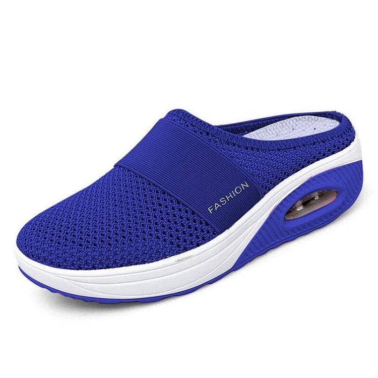 Women wearing lightweight, grey knit air cushion walking sneakers for a sporty casual look.