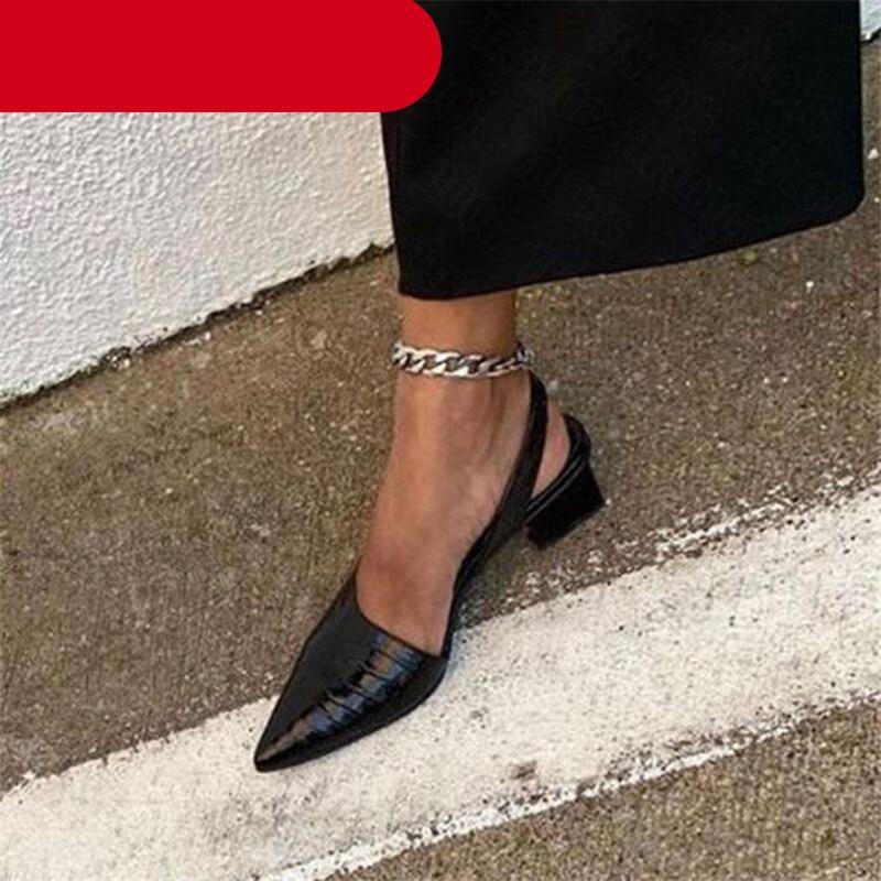 Women's pointed toe slingback sandals with mid-block heels in a vintage-inspired design