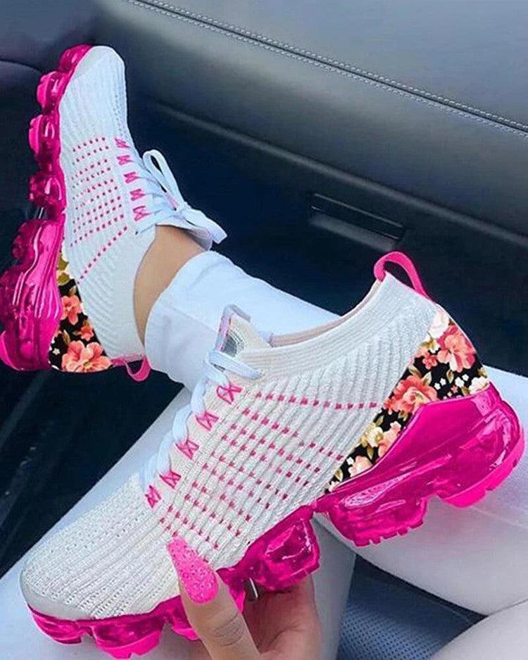 Women's lightweight mesh platform sneakers with air-cushion sole in a stylish, breathable design.