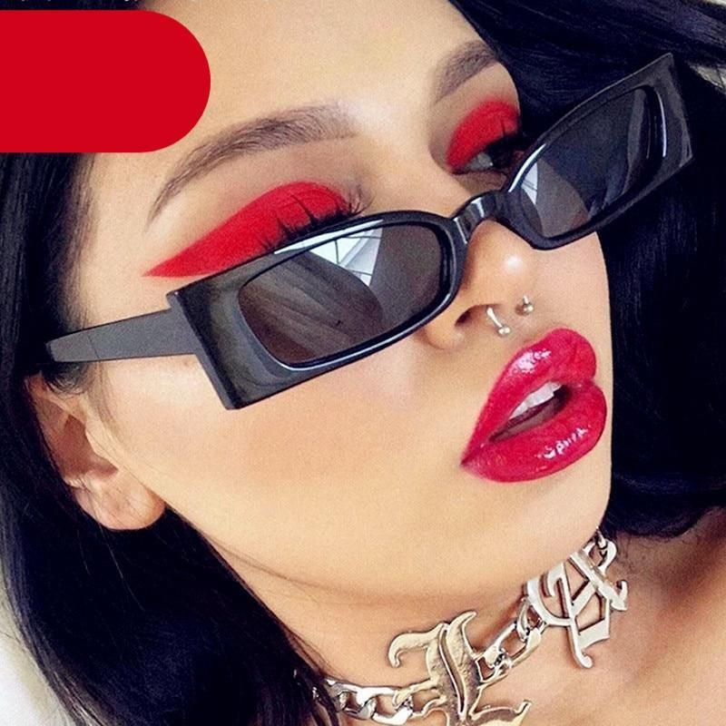 Women wearing stylish minimalist black small rectangle sunglasses with a solid color frame.