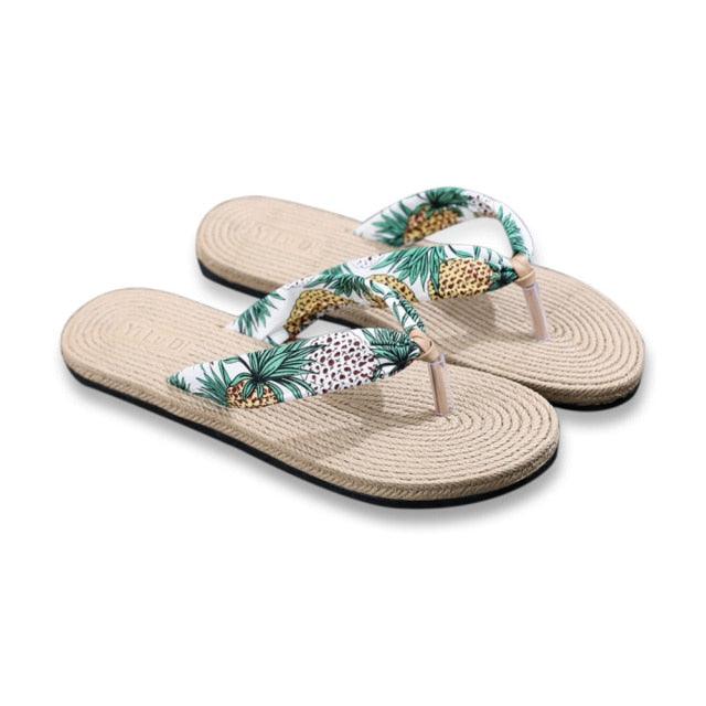 Floral printed flax flip flops with hemp rope accents