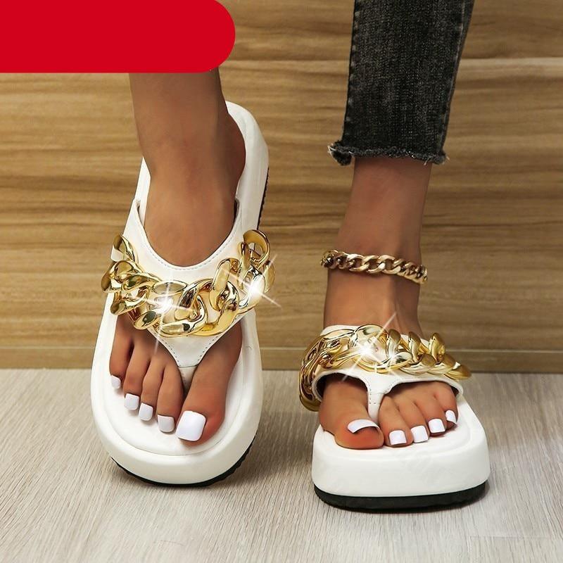 Women's trendy platform slide sandals with gold chain detail in a casual summer style