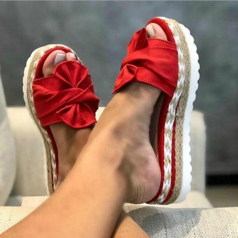 Women's stylish platform slides featuring a soft flock knotted bow and open-toe design