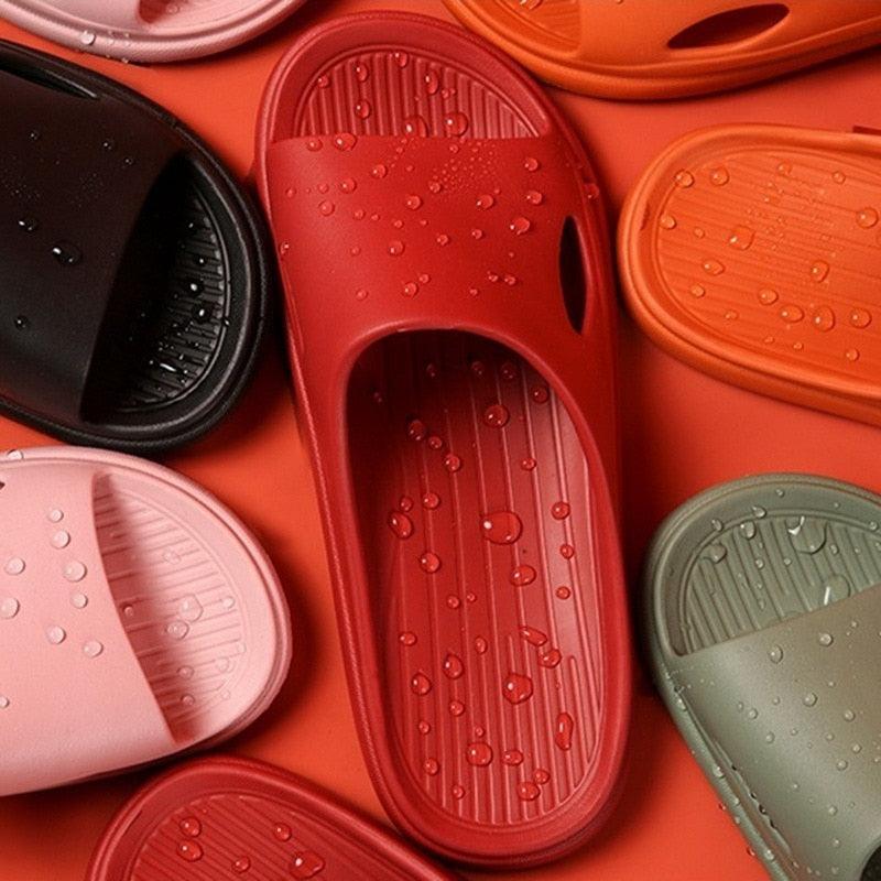 Unisex ergonomic cloud slide sandals with thick sole and massage nodes in a neutral finish