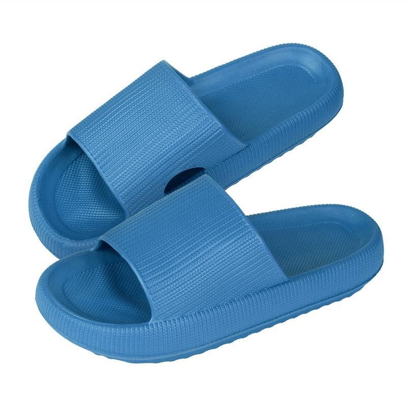 Women's thick platform EVA slide sandals in a soft, open-toe design for beach and home use.
