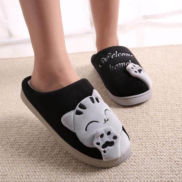 Women's soft furry cat slippers with plush lining and non-slip sole in pastel and neutral colors.