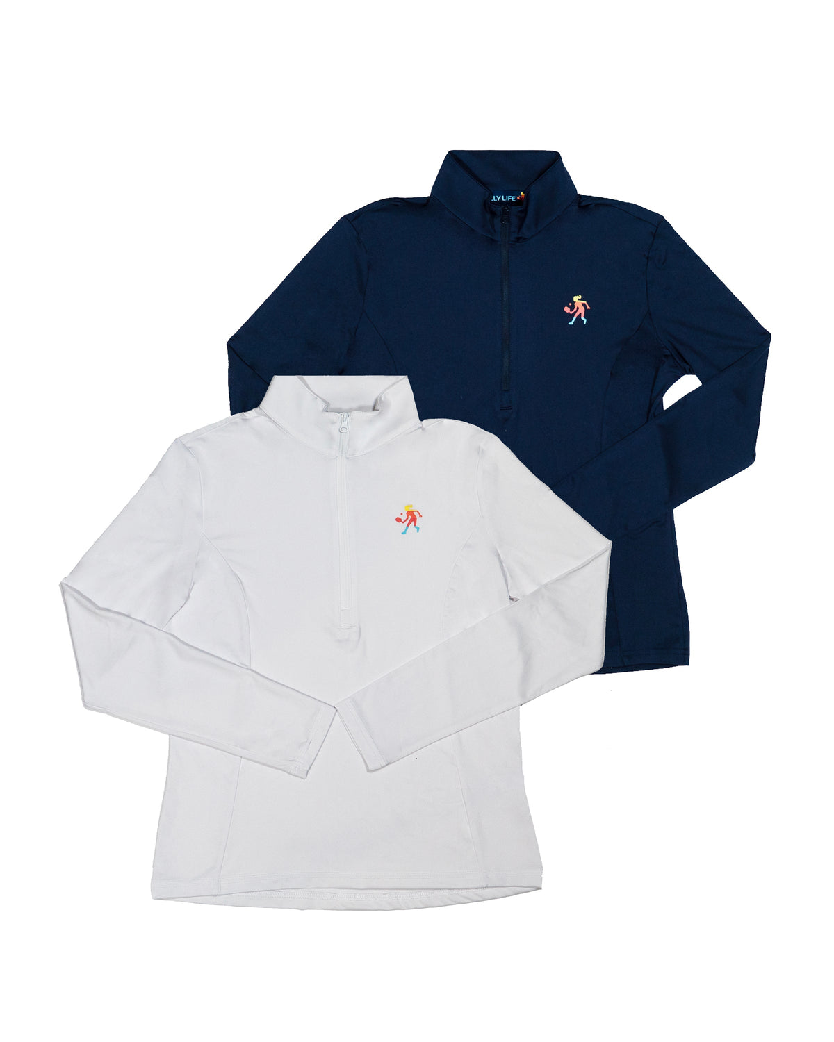 A white and a navy women's long sleeve performance 1/4 zip pullover featuring the Après-pickle logo.