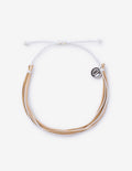Close-up of the Wonder string bracelet, featuring white and tan threads with a small silver logo charm, isolated on a white background.