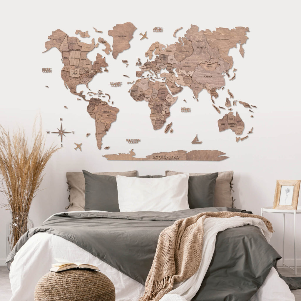 Wooden World Map Wall Decor with Airplane Pins in Brown and Tan
