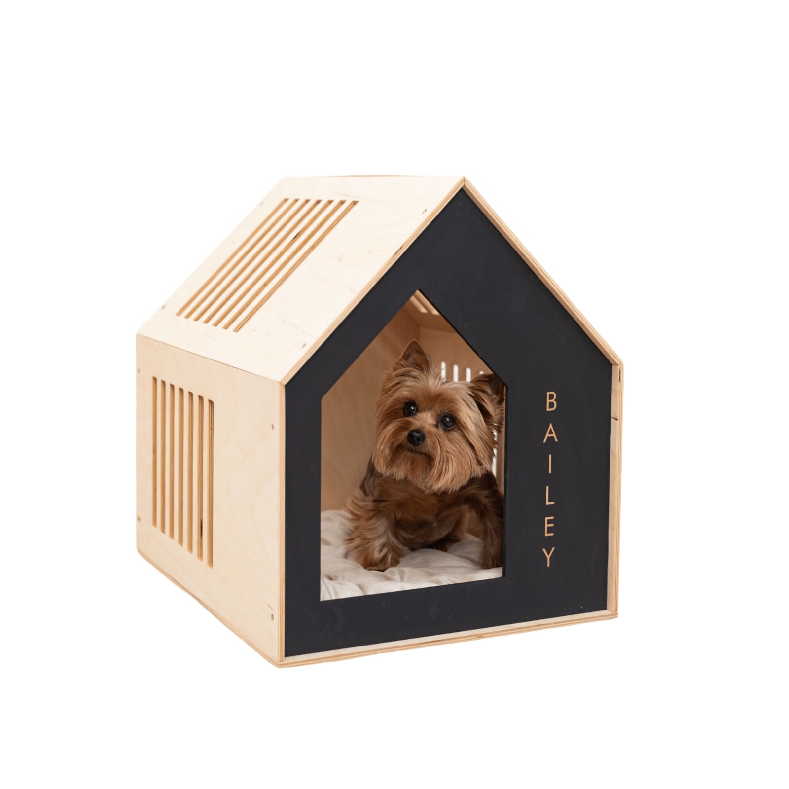 A sleek black booth-style wooden dog house for pets
