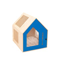 A vibrant blue booth-style wooden dog house with a cozy interior design