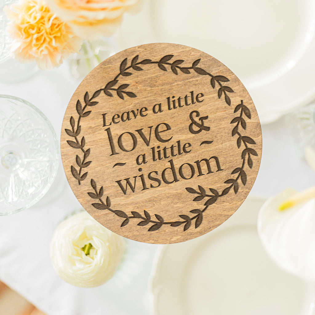 Elegant clear acrylic circle sign featuring In Loving Memory script for wedding memorial decor