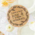 Elegant clear acrylic circle sign featuring In Loving Memory script for wedding memorial decor