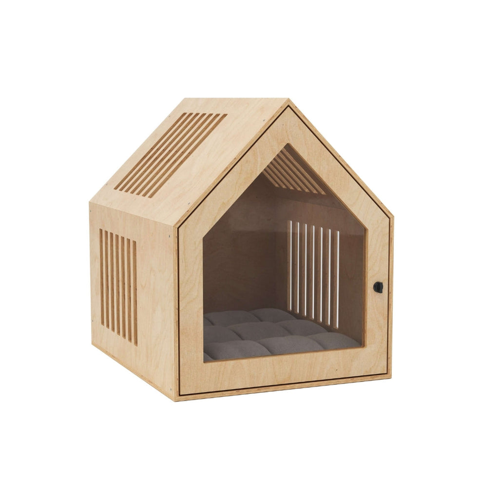 Cozy wooden indoor dog house providing a secure and stylish den for a pet.